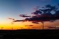 Aug 2017 Ã¢â¬â Xinjiang, China Ã¢â¬â Wind Turbines at sunset in Burqin County, North of Xinjiang Royalty Free Stock Photo